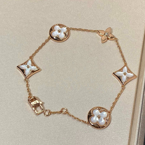 ˇStreet JewelryˇSTAR AND SUN 5 MOTIF MOP PINK GOLD BRACELET
